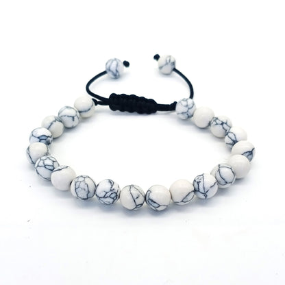 Bracelet œil de tigre 8 mm tressé ajustable